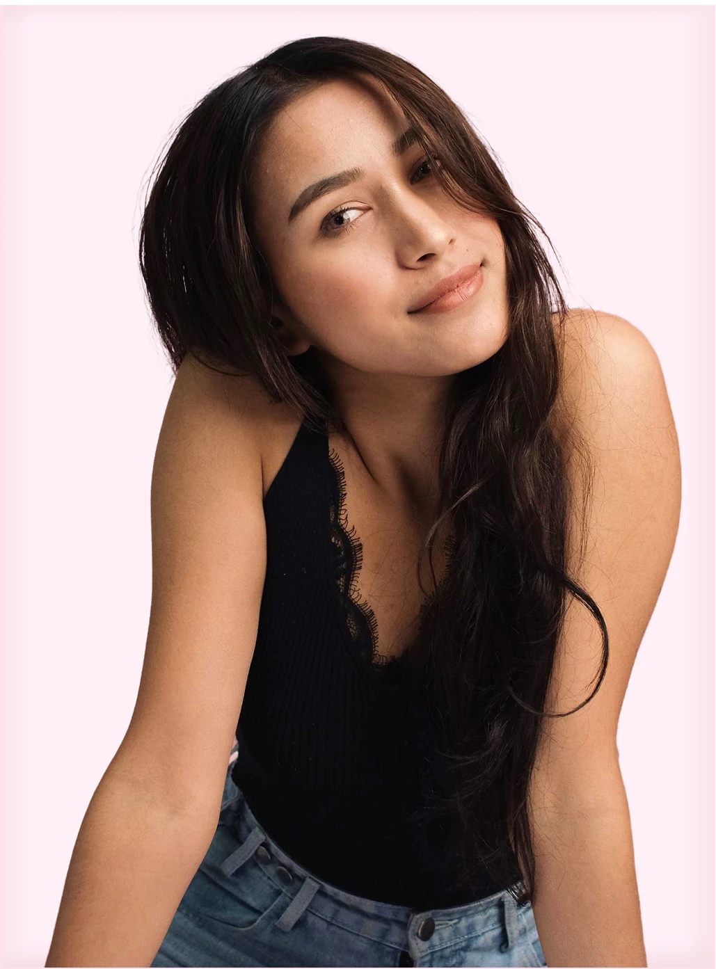 roshani shrestha sitting with smile in her face