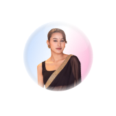 Roshani shrestha with black sari looking into camera with gradient background