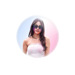 Roshani shrestha with white dress and black sunglasses looking into camera