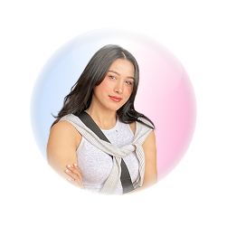 Roshani shrestha with white dress looking into camera with gradient background