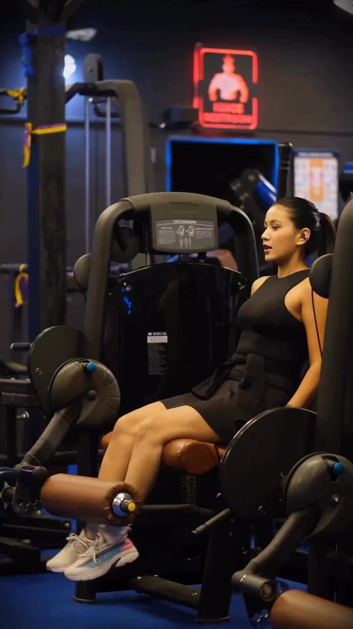 Leg extension excercise doing by roshani shrestha wearing BoAt earbuds